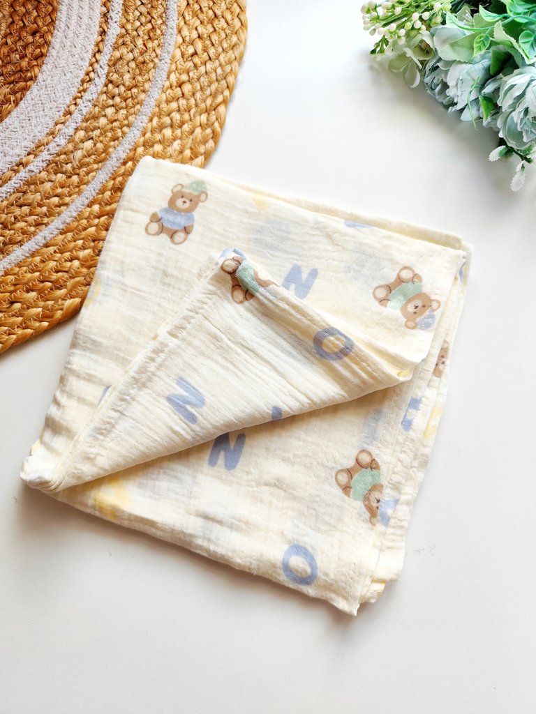 Crinkled Muslin Swaddle/Towel- Cream with Teddy Bear & Letters Print